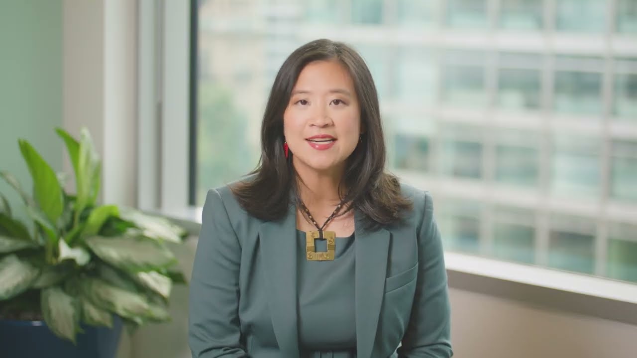Charlyn Ho speaking in a professional interview